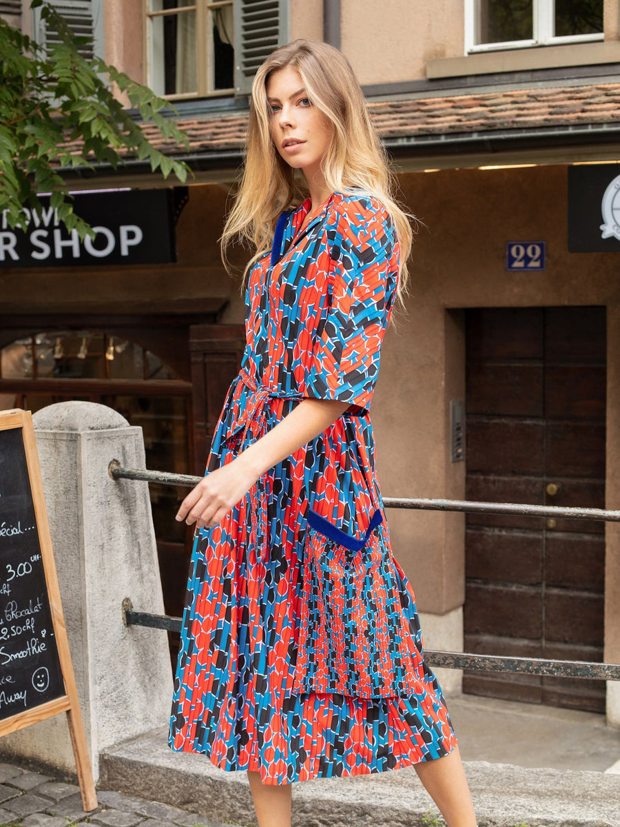 Releve Fashion Appareal Red and Blue Emily Pleated Wrap Dress Sustainable Fashion Conscious Clothing Ethical Designer Brand Technical Design Innovative Materials Purchase with Purpose Shop for Good