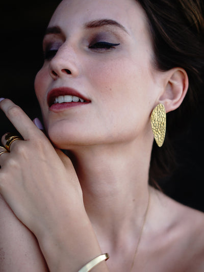 Relevé Fashion Emi & Eve Juno Hammered Earrings in Gold Made of Recycled Missile Shells Responsible Luxury Conflict-Free Jewellery Ethical and Sustainable Designer Brand Purchase with Purpose Shop for Good