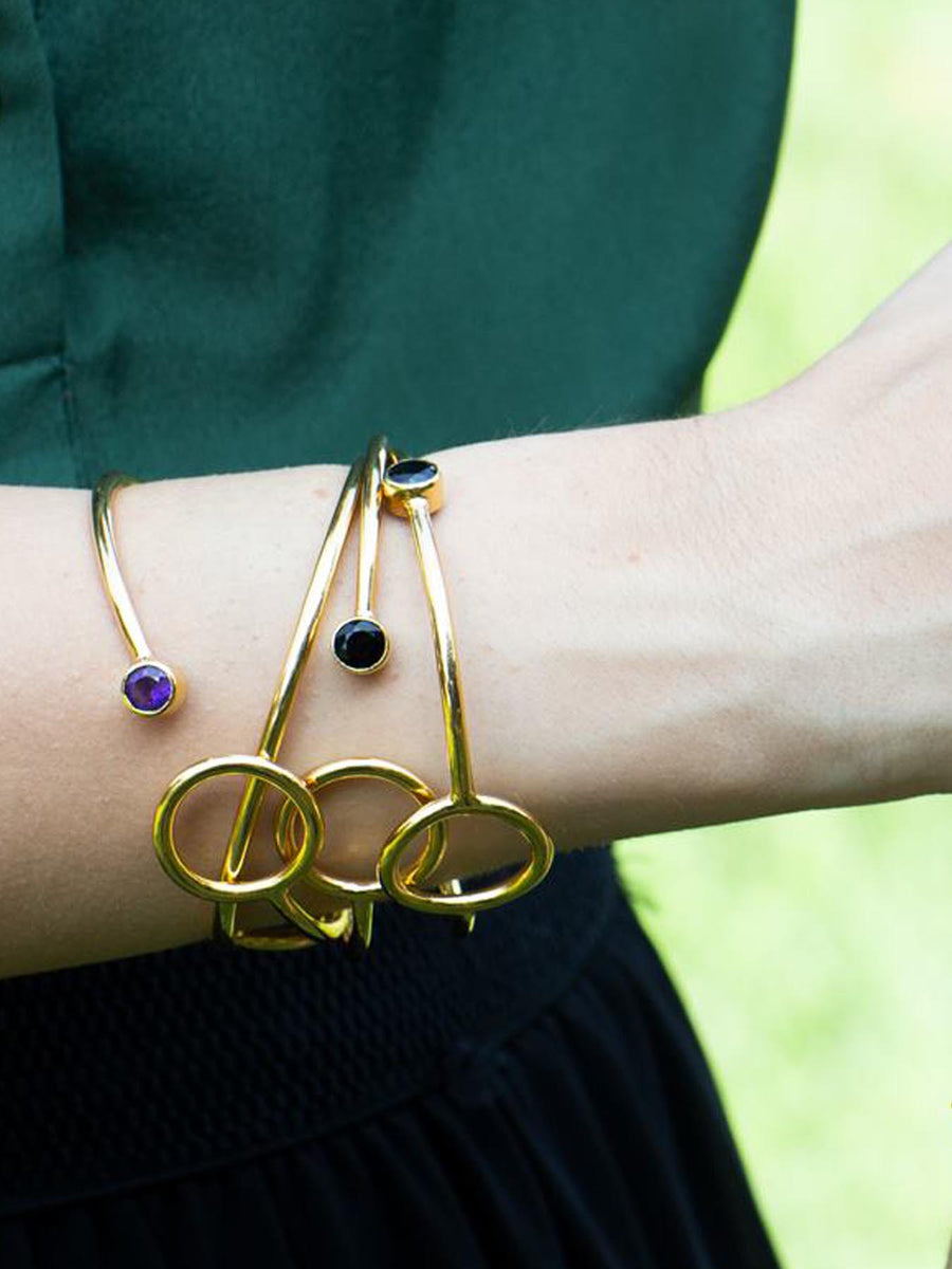 Relevé Fashion Emi & Eve Unity Bangle with Onyx and Gold Made of Recycled Missile Shells Responsible Luxury Conflict-Free Jewellery Ethical and Sustainable Designer Brand Purchase with Purpose Shop for Good