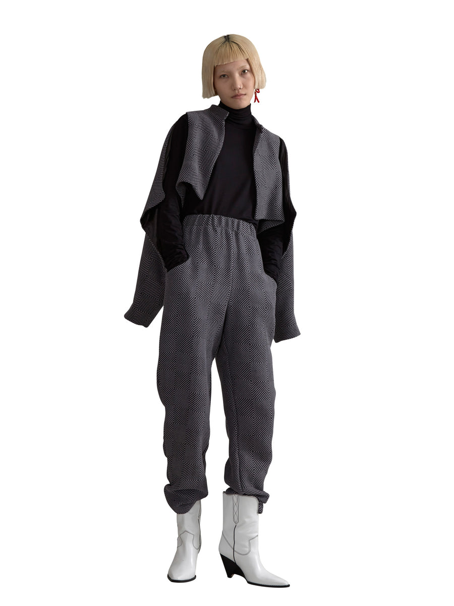 Releve Fashion Harem London Black White Diamond Patterned Efe Organic Cotton Capelet Sustainable Streetwear Style Conscious Clothing Ethical Fashion Designer Brand Handmade Purchase with Purpose Shop for Good