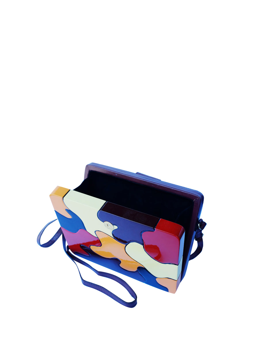 Releve Fashion Joanique Large Aurora Clutch Bag Red Maroon Yellow Orange Ethical Designers Sustainable Fashion Accessory Brand Purchase with Purpose Shop for Good