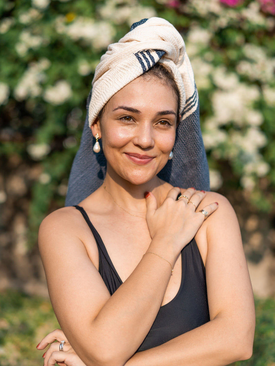 Releve Fashion WVN Living Handwoven Navy Cream Coast Throw Blanket and Towel Sustainable Luxury Fashion Conscious Clothing and Lifestyle Accessories Ethical Designer Brand Artisanal Handcrafted Beachwear Home Accessories Purchase with Purpose Shop for Good