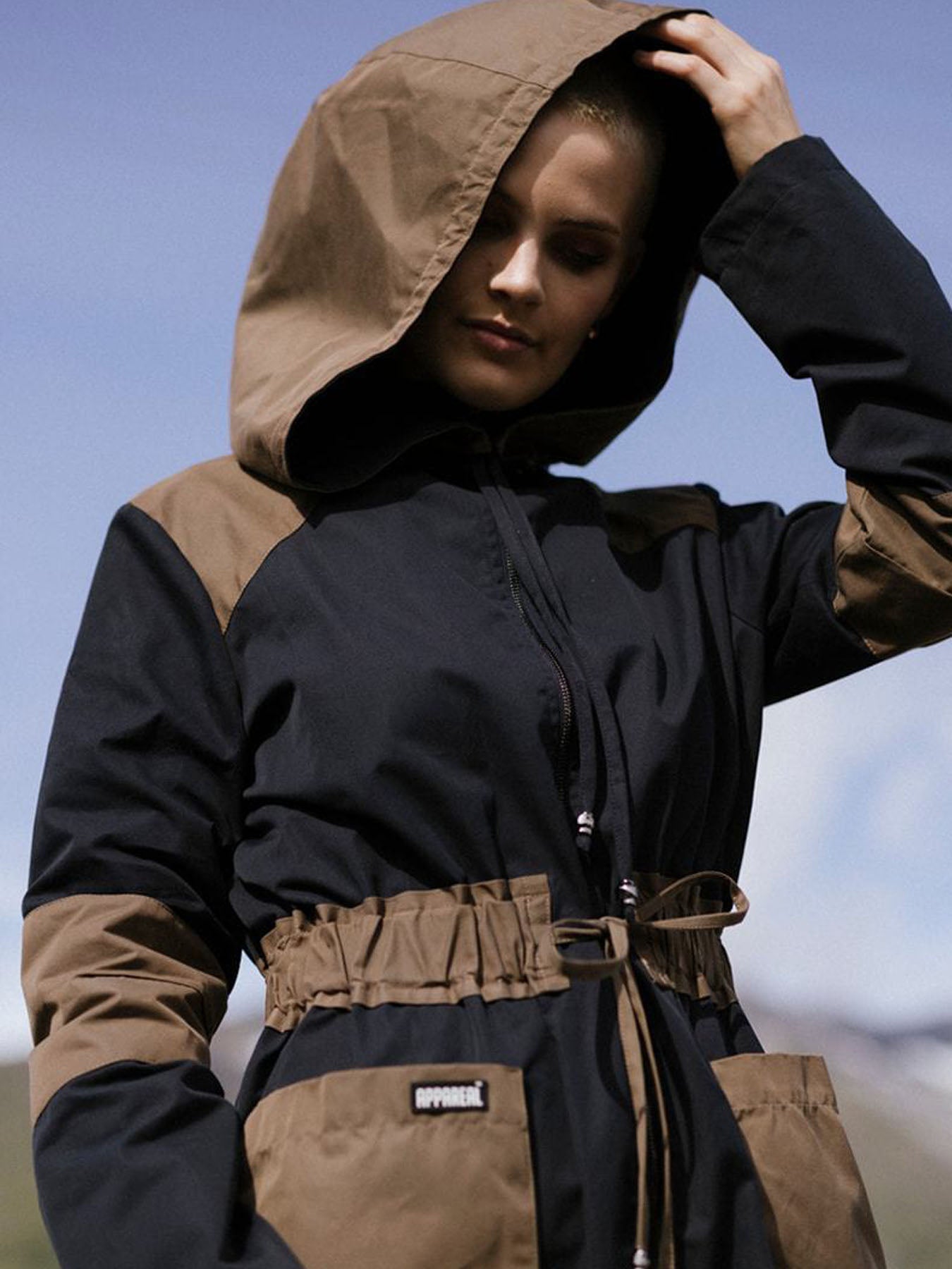 Releve Fashion Appareal Black Brown Melissandra Recycled Cotton Parka Sustainable Fashion Conscious Clothing Ethical Designer Brand Technical Design Innovative Materials Purchase with Purpose Shop for Good