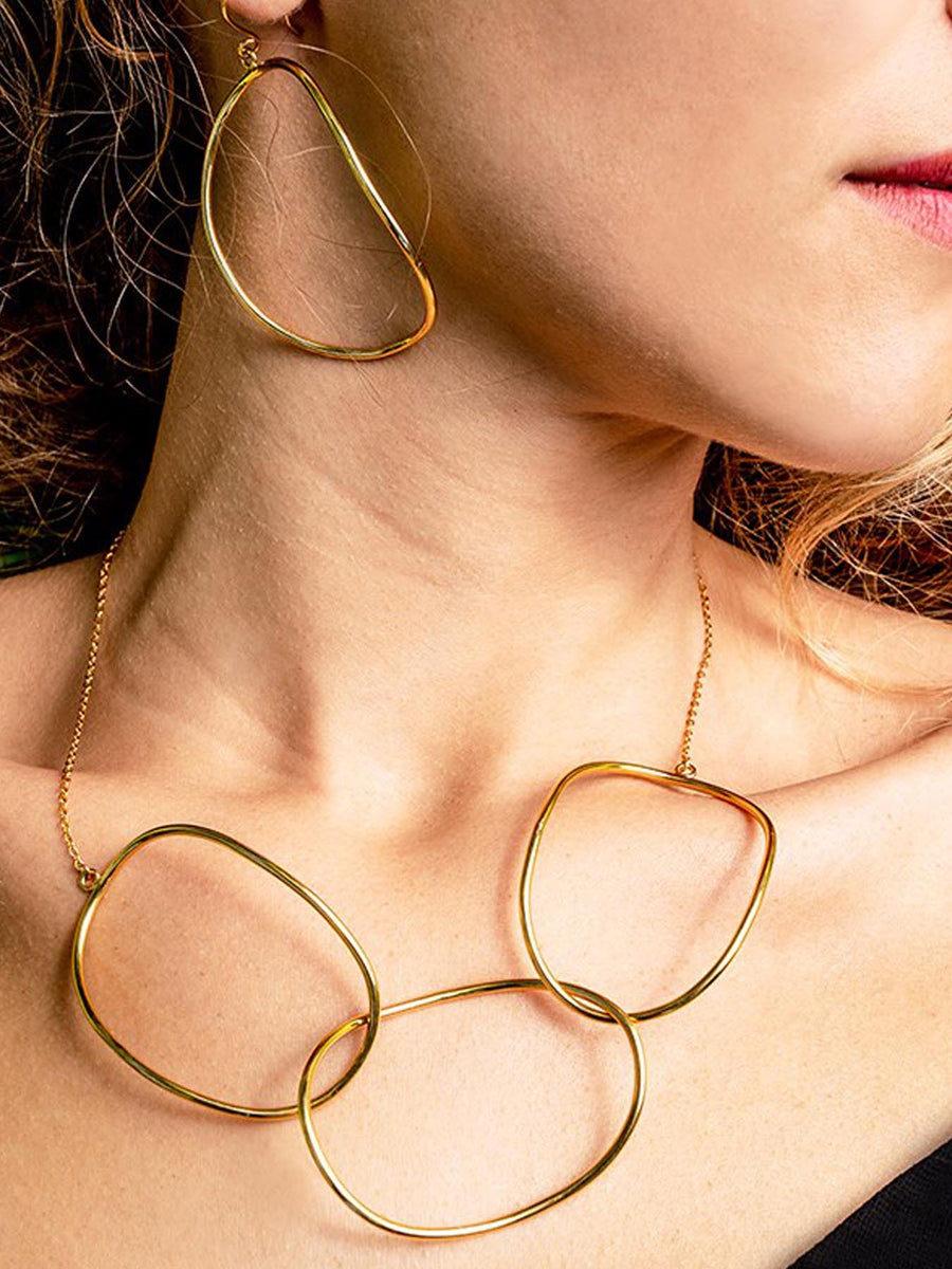 Relevé Fashion Emi & Eve Freedom Necklace in Gold Made of Recycled Missile Shells Responsible Luxury Conflict-Free Jewellery Ethical and Sustainable Designer Brand Purchase with Purpose Shop for Good