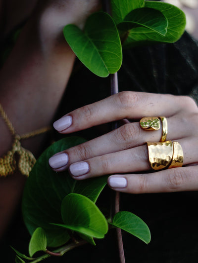 Relevé Fashion Emi & Eve Juno Hammered Wrap Ring in Gold Made of Recycled Missile Shells Responsible Luxury Conflict-Free Jewellery Ethical and Sustainable Designer Brand Purchase with Purpose Shop for Good