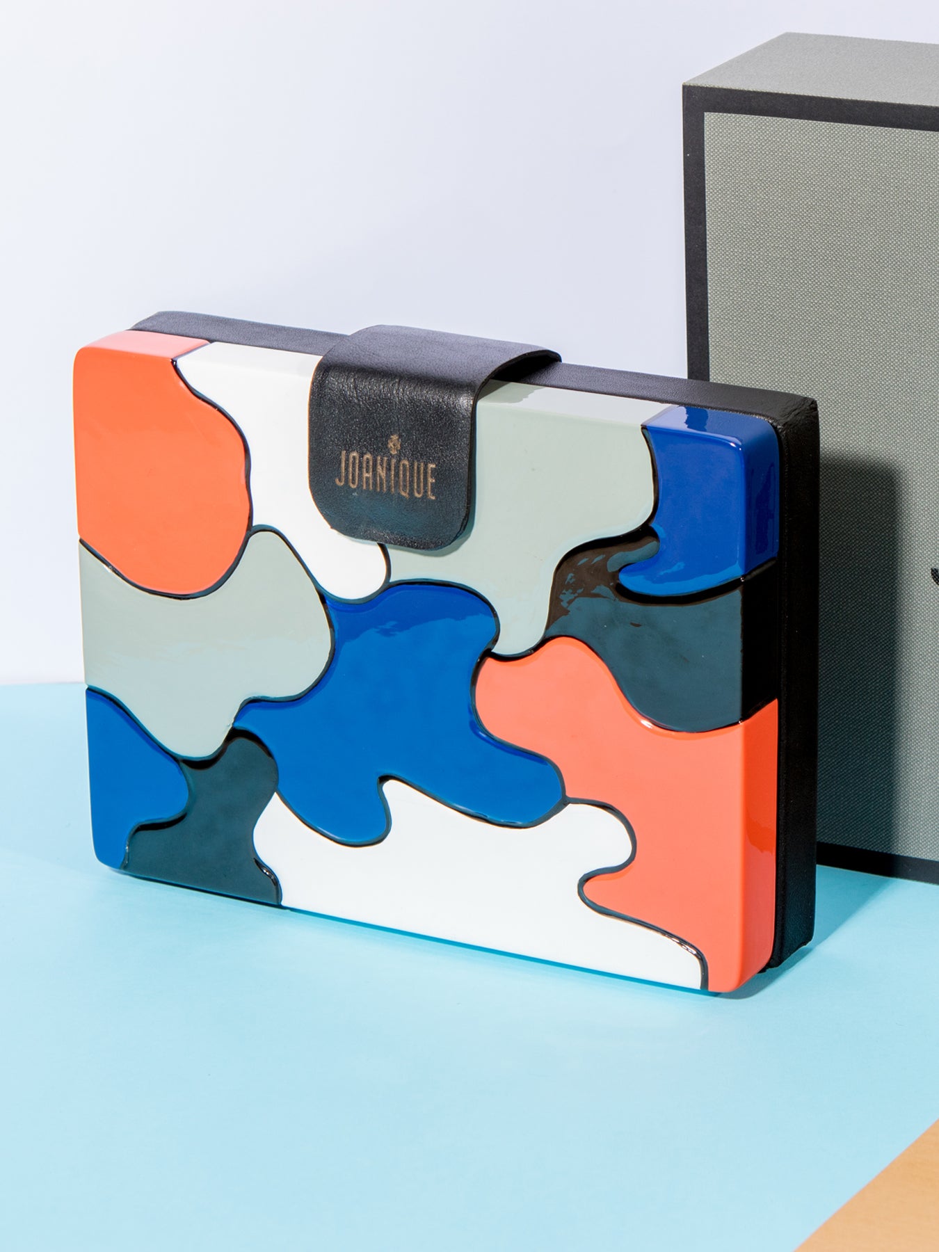 Releve Fashion Joanique Small Aurora Clutch Bag Black Blue Red White Ethical Designers Sustainable Fashion Accessory Brand Purchase with Purpose Shop for Good