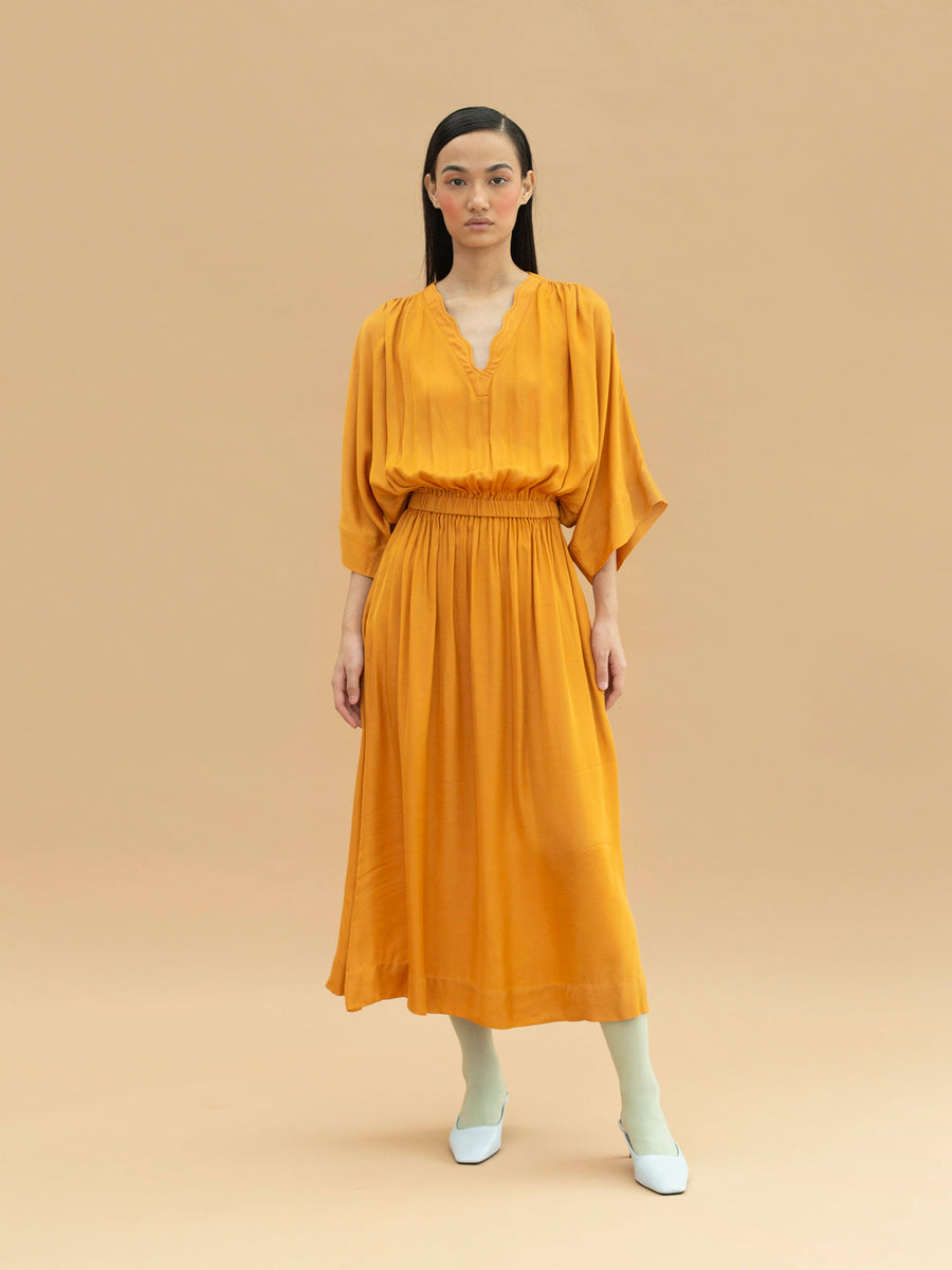 Releve Fashion Mollusk Orange Fibre Fabric Loose Fit Midi Dress Sustainable Luxury Fashion Conscious Clothing Ethical Designer Brand Artisanal Handcrafted Purchase with Purpose Shop for Good