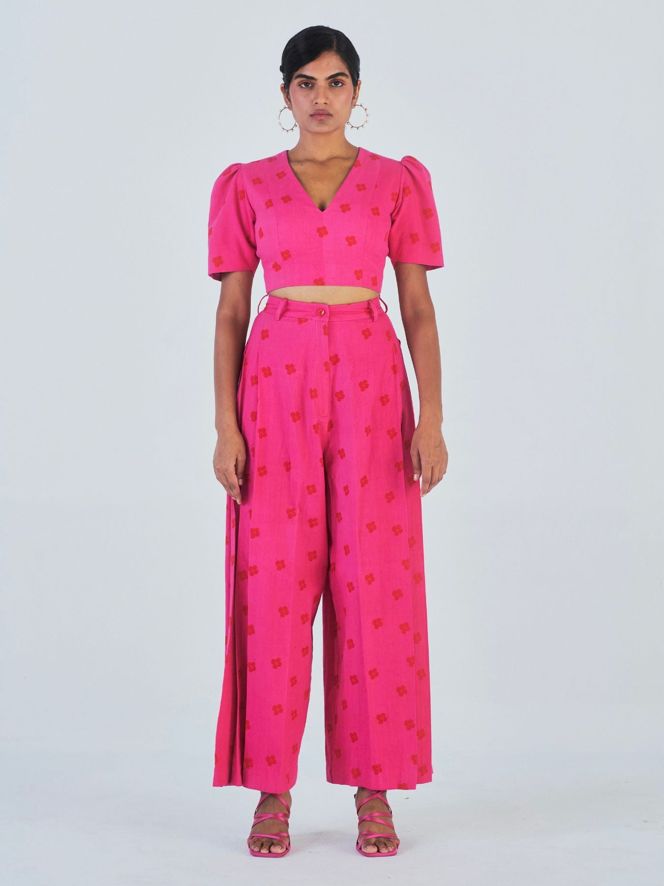 https://relevefashion.com/cdn/shop/products/Releve_Fashion_Little_Things_Studio_Padma_Crop_Top_Trouser_Set_Hot_Pink_Red_Floral_Print_Padma_Crop_Top_Trouser_Set_Hot_Pink_Red_Floral_Print_5_9232303a-8b0e-45ca-8995-b31c201f18a8_2000x.jpg?v=1664093894