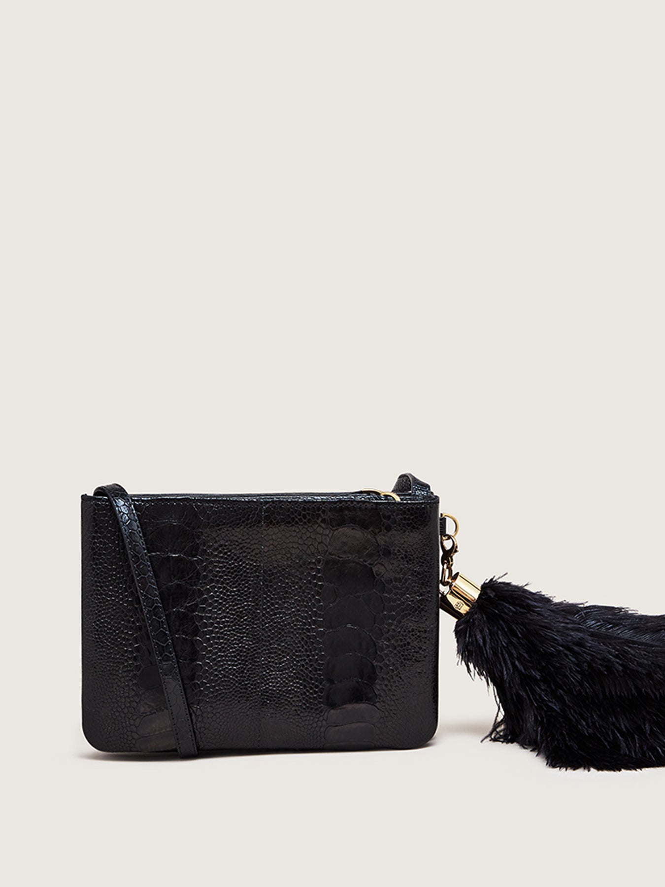 Releve Fashion Okapi Aja Quentin Jones Clutch Black Sustainable Ethical Fashion Brand Positive Luxury Positive Fashion Purchase with Purpose Shop for Good