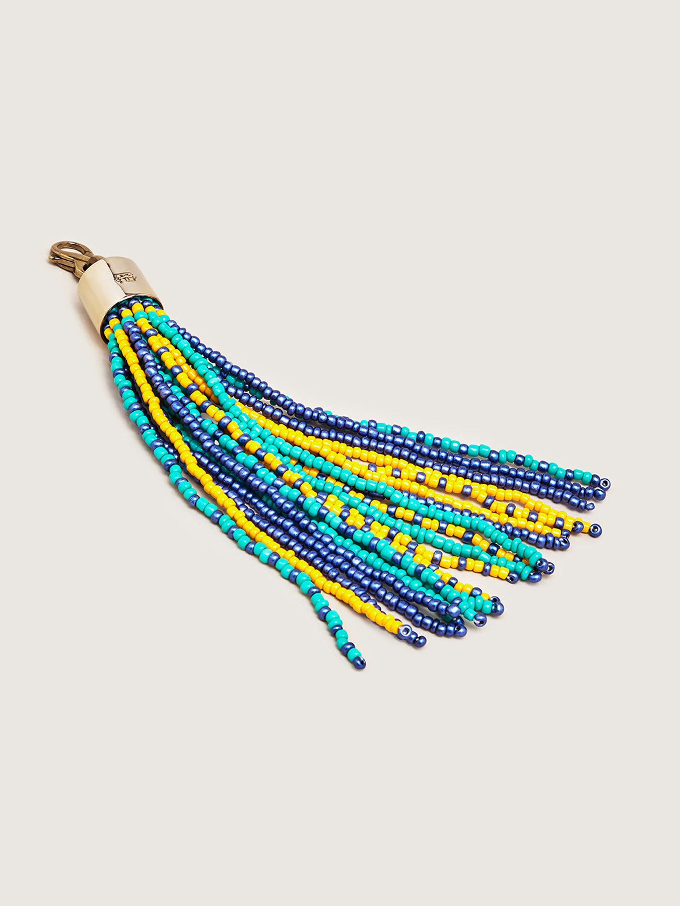 Releve Fashion Okapi Clip On Beaded Tassel Bag Charm Green Yellow Navy Sustainable Ethical Fashion Brand Positive Luxury Positive Fashion Purchase with Purpose Shop for Good