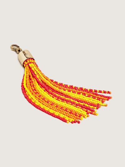 Releve Fashion Okapi Clip On Beaded Tassel Bag Charm Red Yellow Orange Sustainable Ethical Fashion Brand Positive Luxury Positive Fashion Purchase with Purpose Shop for Good