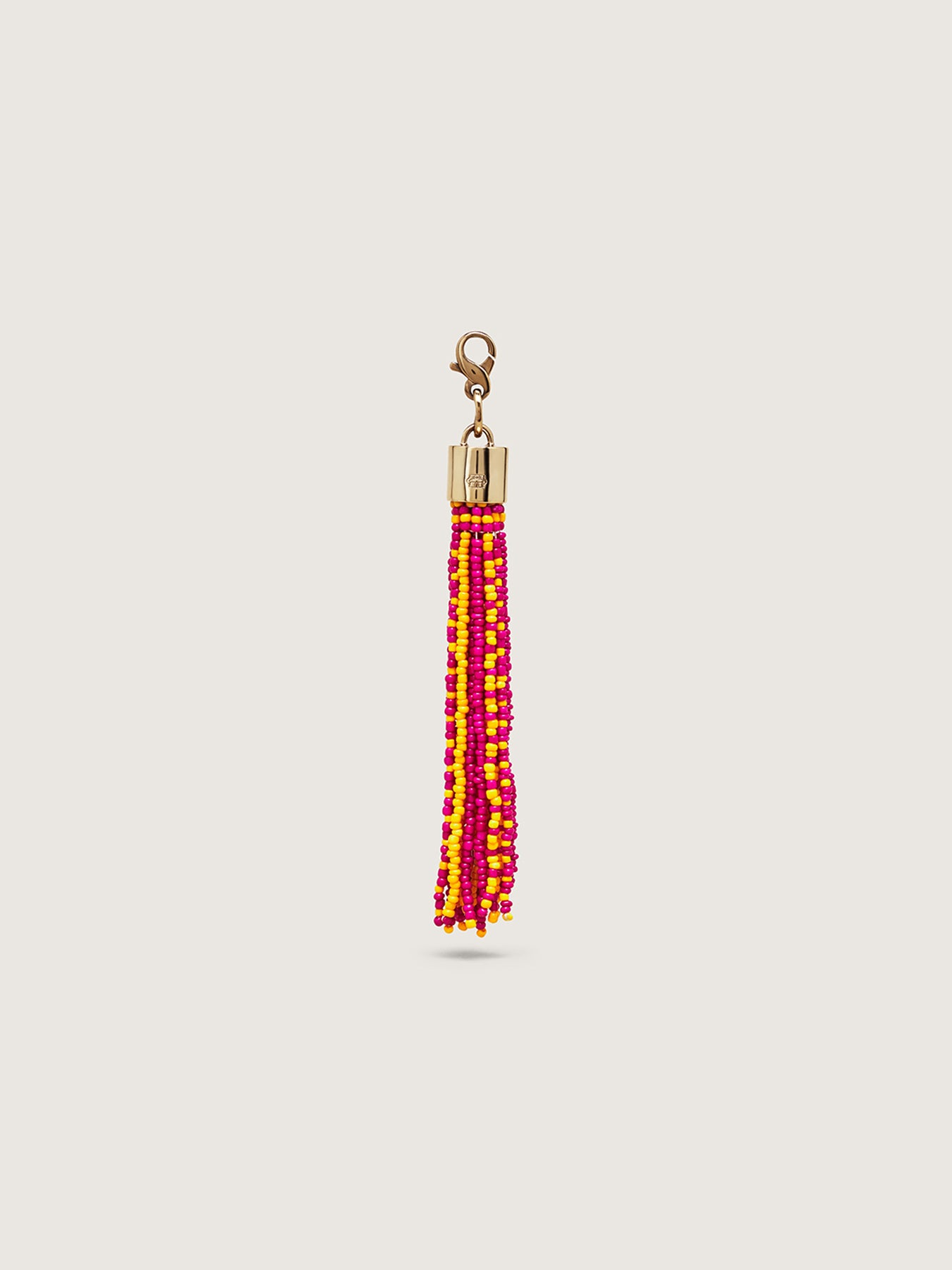 Releve Fashion Okapi Clip On Beaded Tassel Bag Charm Yellow Fuchsia Dark Yellow Sustainable Ethical Fashion Brand Positive Luxury Positive Fashion Purchase with Purpose Shop for Good