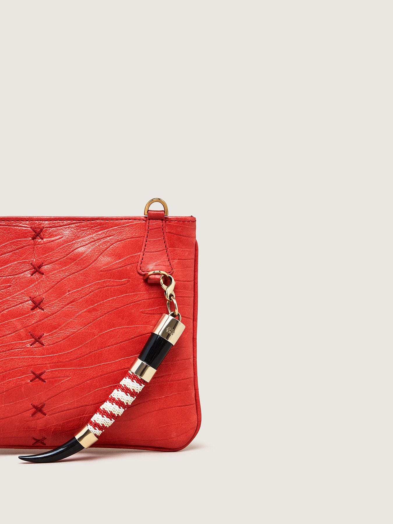 Releve Fashion Okapi Clutch Bag Scarlet Red Zebra Blesbok Gold Hardware Sustainable Ethical Fashion Brand Positive Luxury Positive Fashion Purchase with Purpose Shop for Good