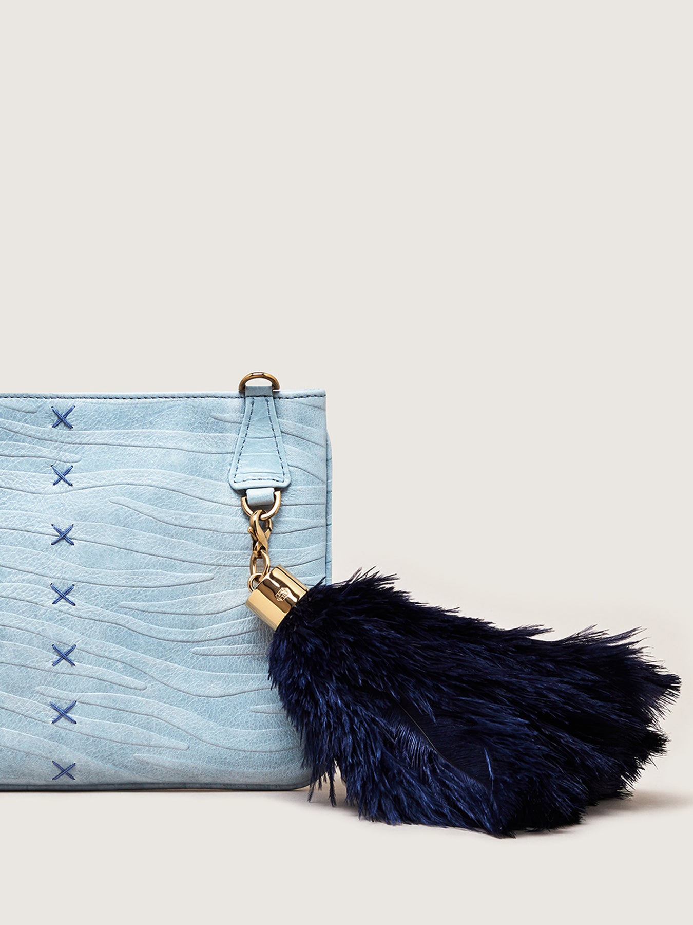 Releve Fashion Okapi Clutch Bag LQP Blue Zebra Blesbok Gold Hardware Sustainable Ethical Fashion Brand Positive Luxury Positive Fashion Purchase with Purpose Shop for Good