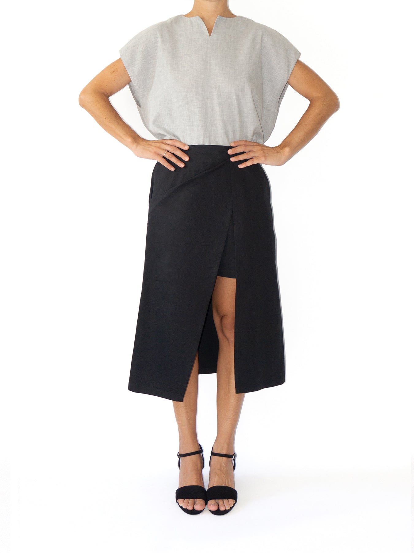 Releve Fashion Port Zienna Black Minilog Double-Layered Asymmetric Skirt Sustainable Luxury Fashion Conscious Clothing Ethical Designer Brand Eco Design Innovative Materials Purchase with Purpose Shop for Good