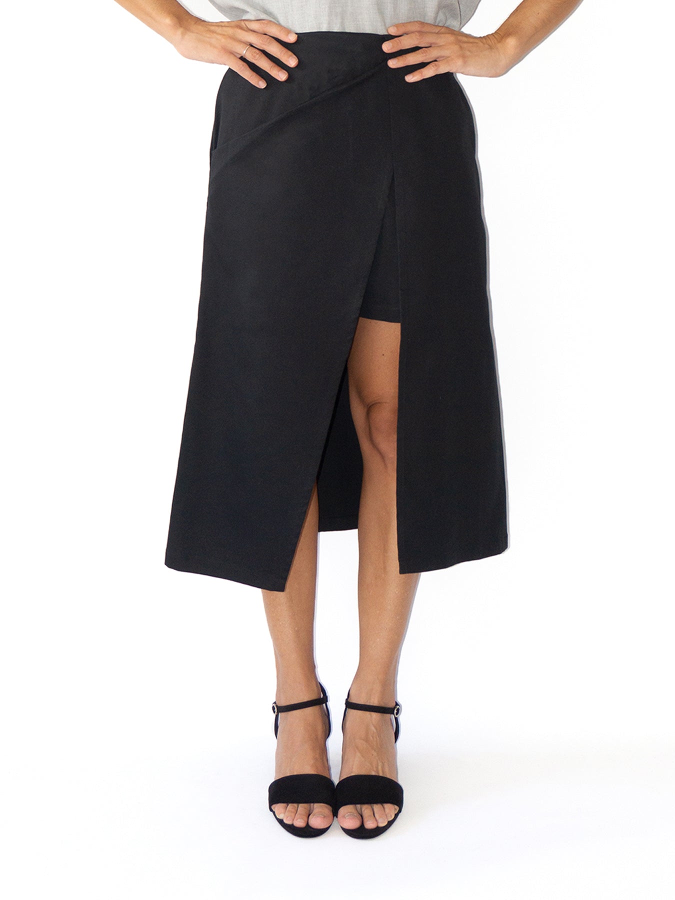 Releve Fashion Port Zienna Black Minilog Double-Layered Asymmetric Skirt Sustainable Luxury Fashion Conscious Clothing Ethical Designer Brand Eco Design Innovative Materials Purchase with Purpose Shop for Good