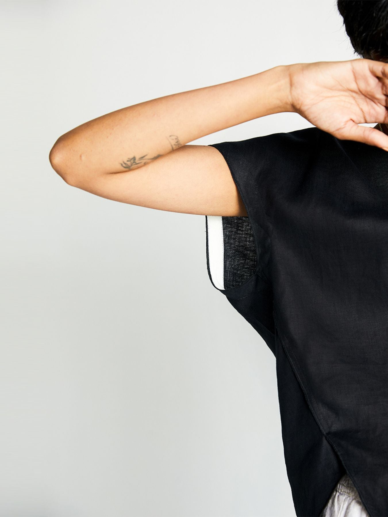 Releve Fashion Reistor The Black Box Top Black Ethical Designer Brand Sustainable Fashion Conscious Clothing Purchase with Purpose Shop for Good