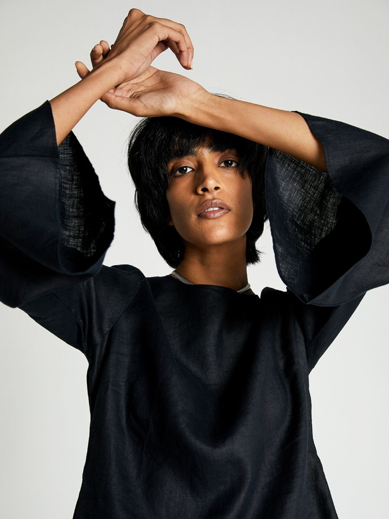 Releve Fashion Reistor The Button Back Shirt Black Ethical Designer Brand Sustainable Fashion Conscious Clothing Purchase with Purpose Shop for Good