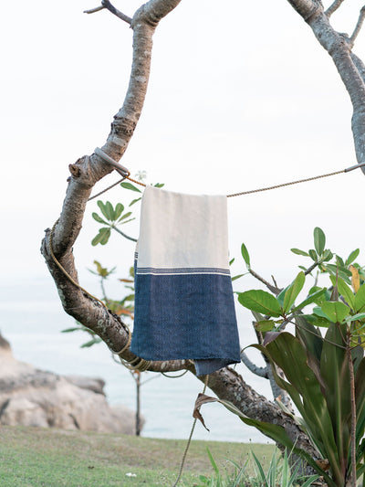 Releve Fashion WVN Living Handwoven Navy Cream Coast Throw Blanket and Towel Sustainable Luxury Fashion Conscious Clothing and Lifestyle Accessories Ethical Designer Brand Artisanal Handcrafted Beachwear Home Accessories Purchase with Purpose Shop for Good